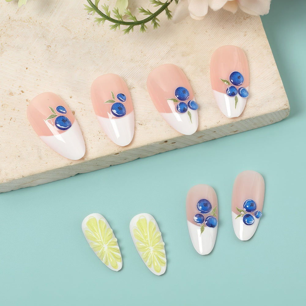 Artificial nails with elegant floral patterns and accents Stornfield