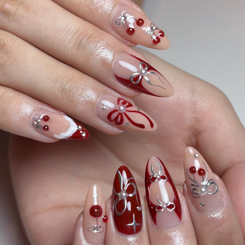 Creative nail art set with romantic heart and bow motifs Stornfield