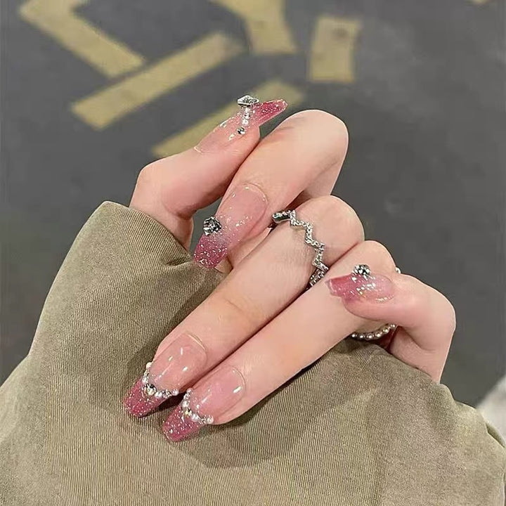 Glamorous artificial nails with sparkling accents Stornfield