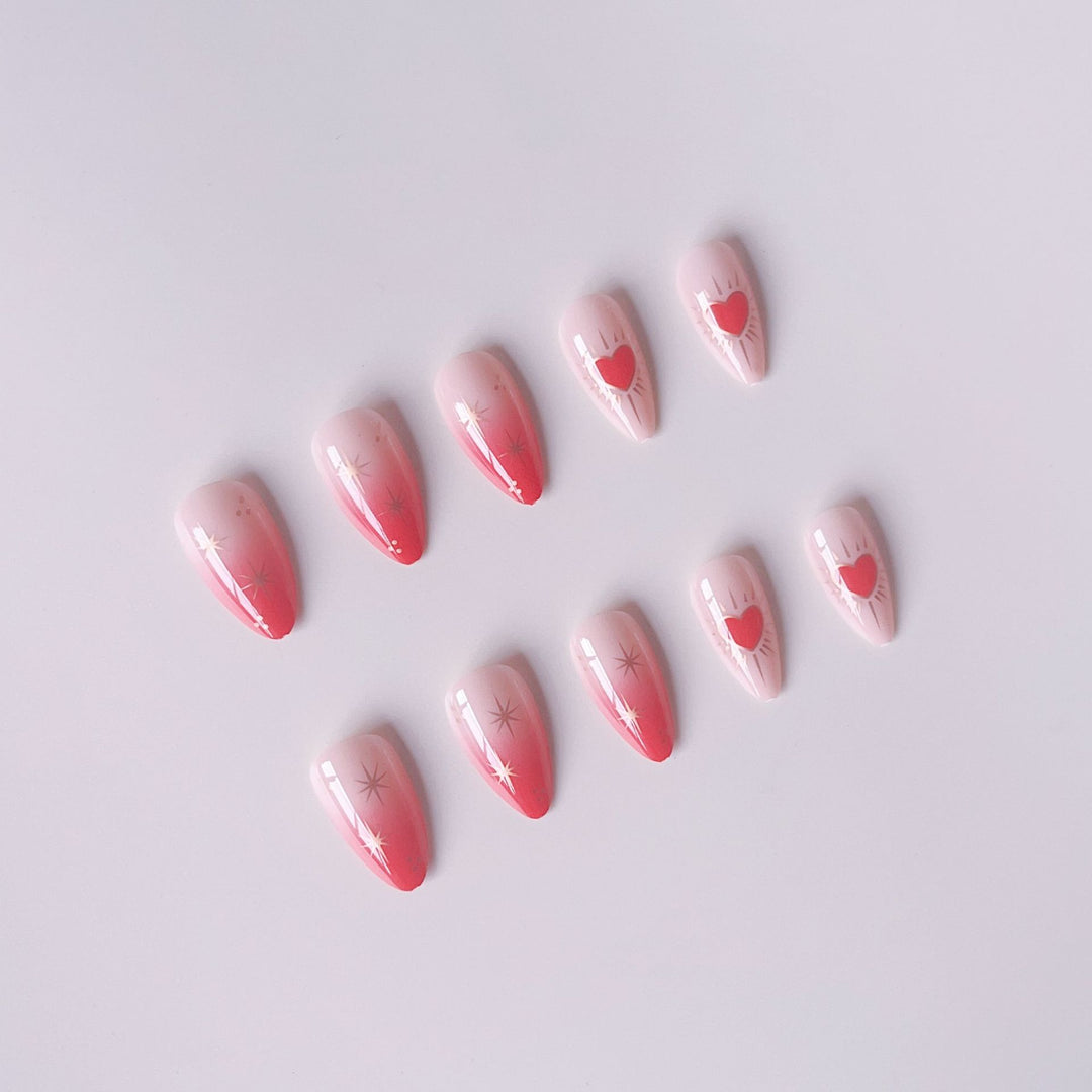 Glamorous artificial nail tips with heart and star decorations Stornfield