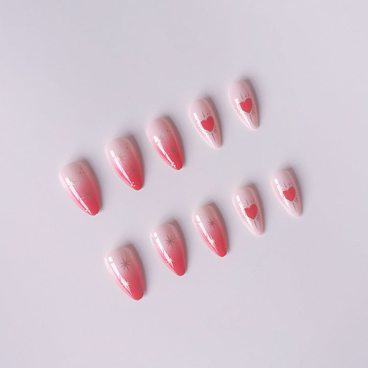 Glamorous artificial nail tips with heart and star decorations Stornfield