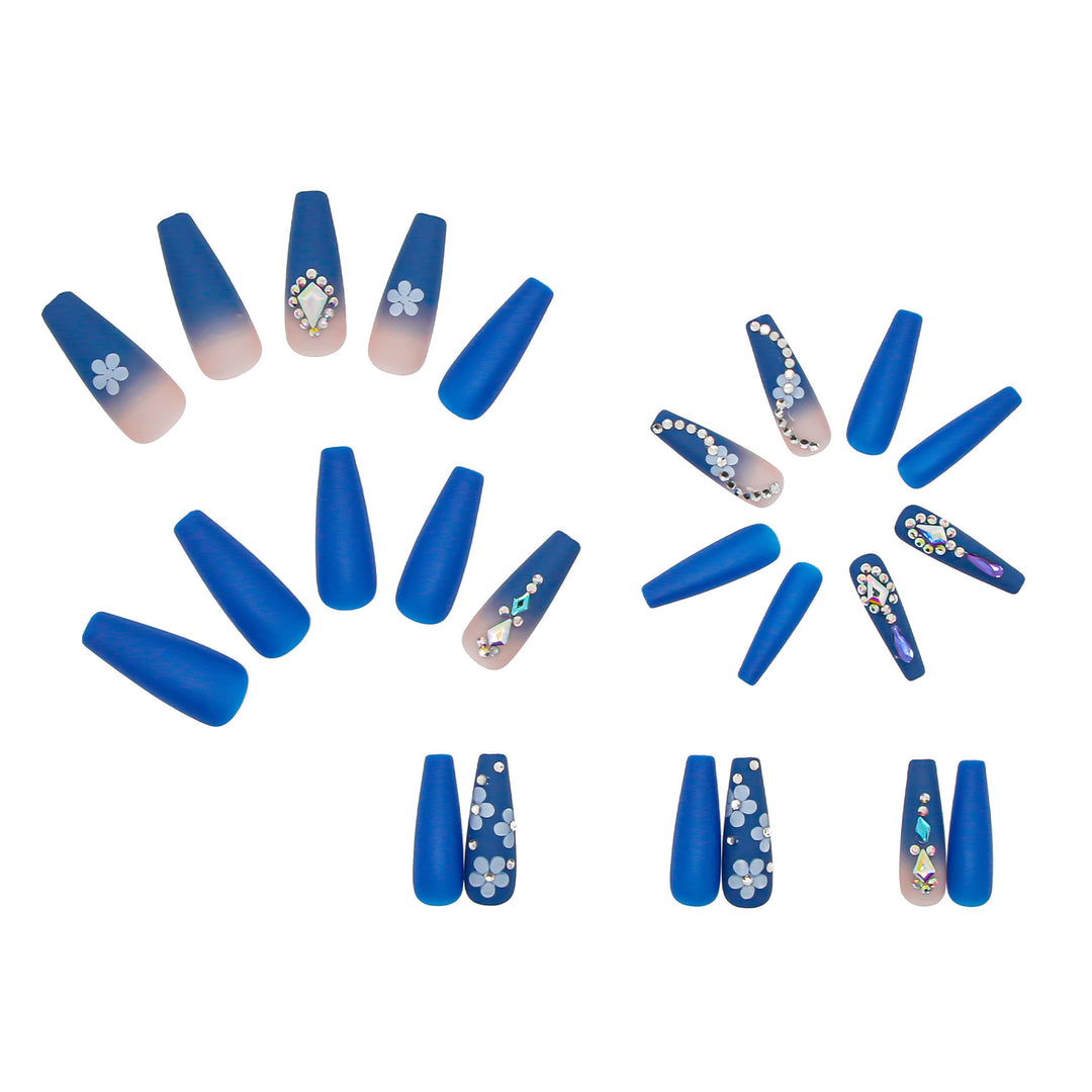 Nail art set with elegant 3D flower designs and glitter accents Stornfield
