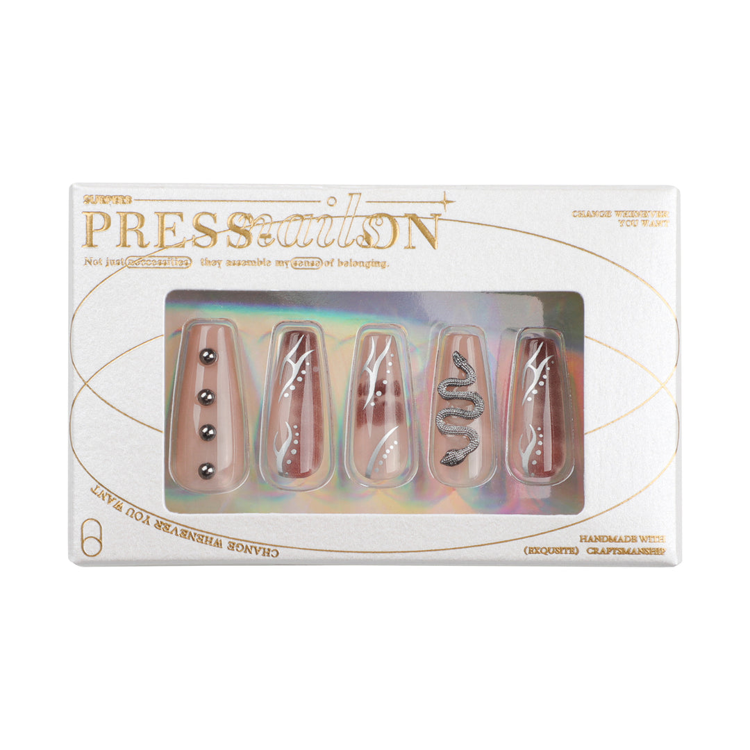 Artistic fingernails with snake and glitter accents Stornfield