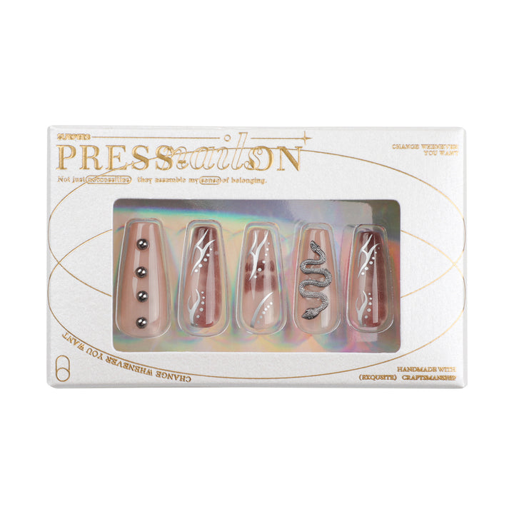 Artistic fingernails with snake and glitter accents Stornfield