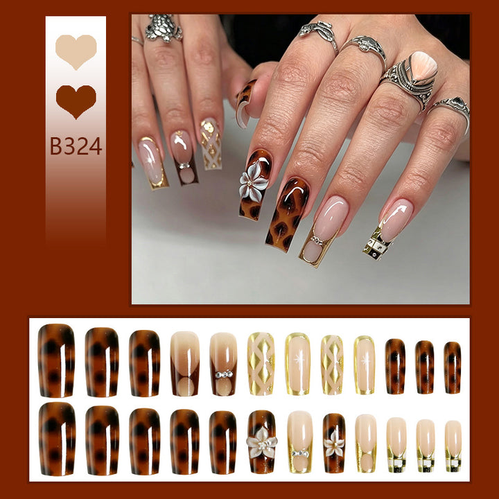 Acrylic nail set with glamorous decorations and elegant designs Stornfield
