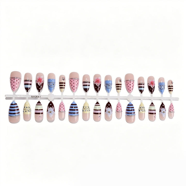 Creative nail art set with floral and striped accents Stornfield