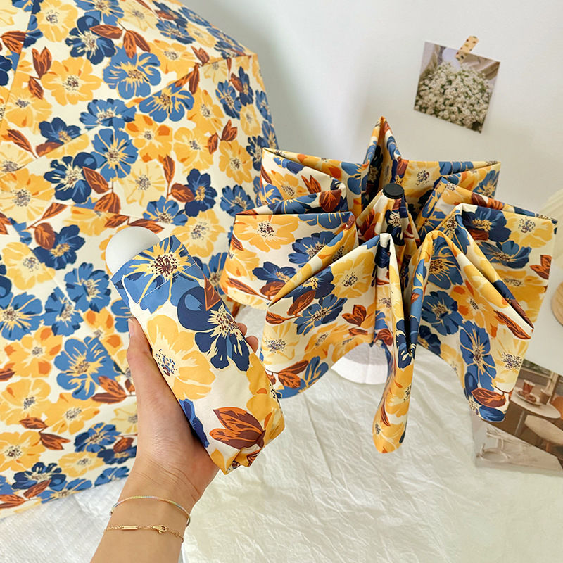 Women Folding Umbrella with Detailed Floral Design Stornfield