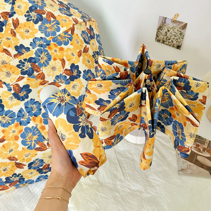 Women Folding Umbrella with Detailed Floral Design Stornfield