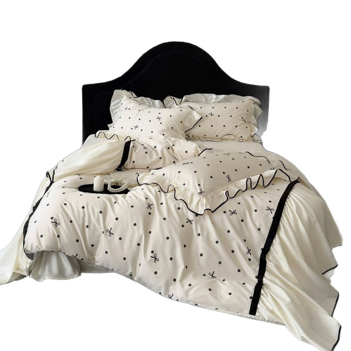 Reversible Polka-Dot Satin-Feel Ruffled Duvet Cover Set with Black Piping and Decorative Shams
