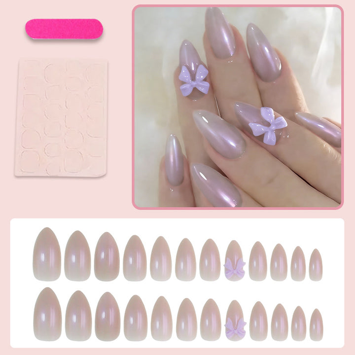 Artificial nail set with elegant bows and gentle design Stornfield