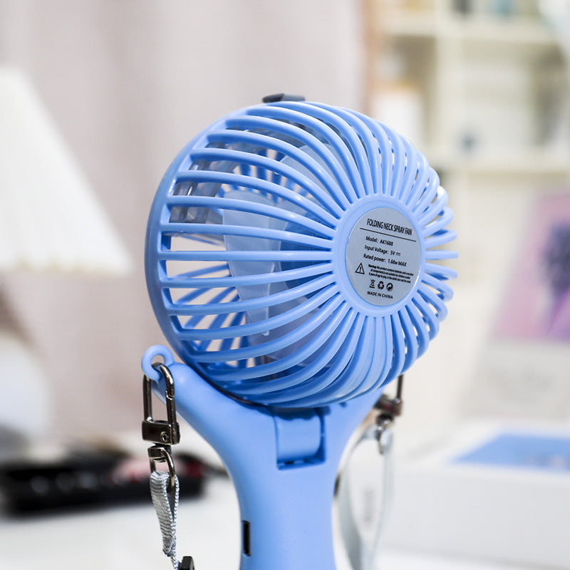 Women's Portable Mini Fan with Spray Function and Flexible Mounting System Stornfield