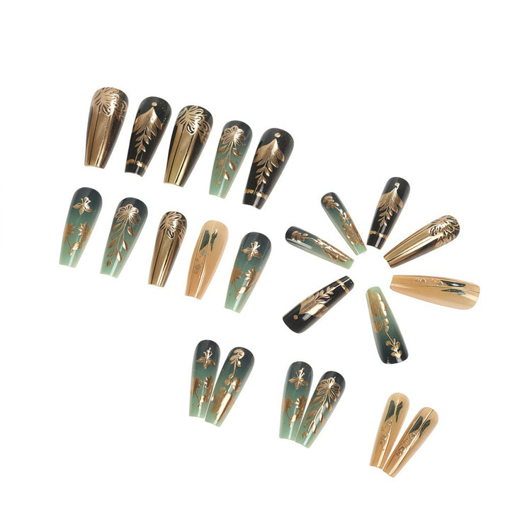 Artificial nails with floral gold embellishments Stornfield