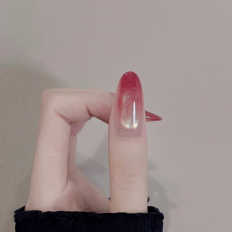 Glossy Ombre Nail Extensions with Gold Accents