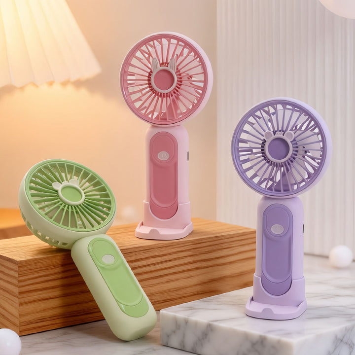 Unisex compact USB handheld fan with removable stand and quiet motor Stornfield