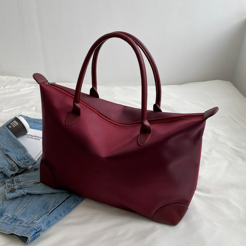 Large travel bag with durable material and multiple compartments Stornfield