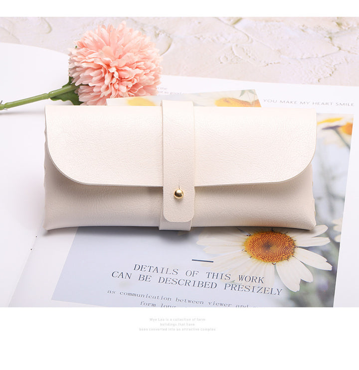 Unisex glasses case made of high-quality leather with button-crafted closure Stornfield