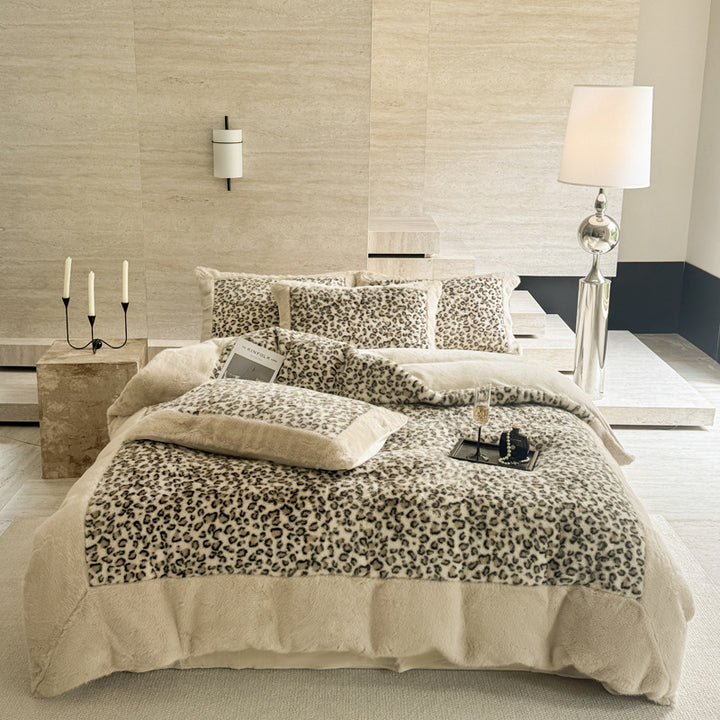 Plush bedding set with leopard faux fur and reversible function