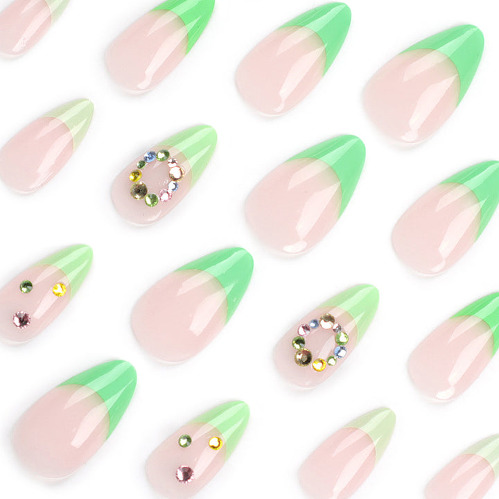 Artificial nail art with spring-like design and sparkling accents Stornfield