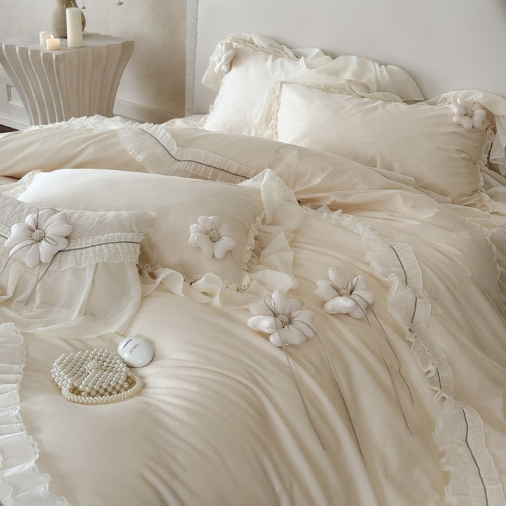 Romantic bedding set made of cotton satin with ruffled flounce, layered ruffles, and decorative fabric flowers