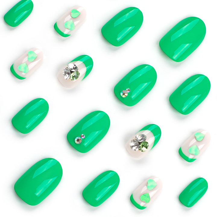 Artistic Nail Extensions with Lovable Heart Patterns and Glitter Accents Stornfield