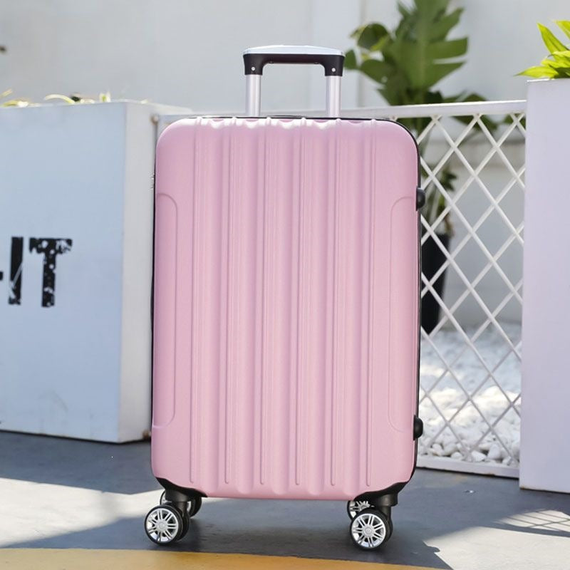 Hard shell suitcase with 360-degree wheel system and integrated safety feature Stornfield