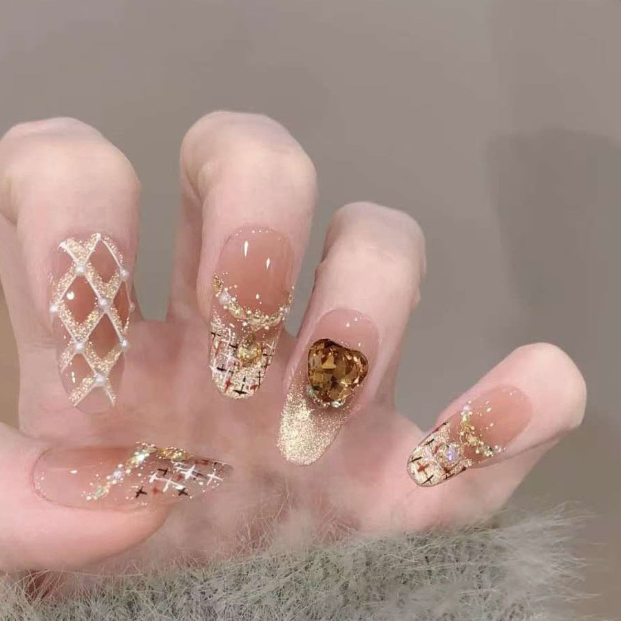 Artificial nails with glamorous rhinestone decorations Stornfield