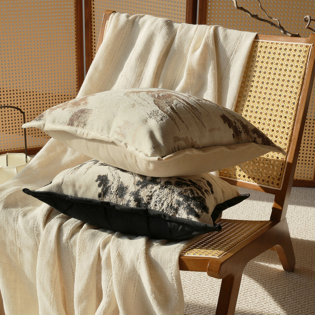 Elegant decorative pillow with intricate landscape illustration