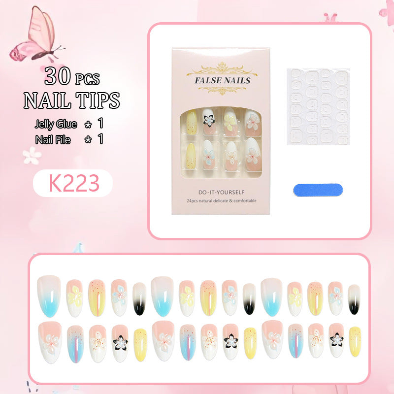 Artificial nail set with floral and glittering decorations Stornfield