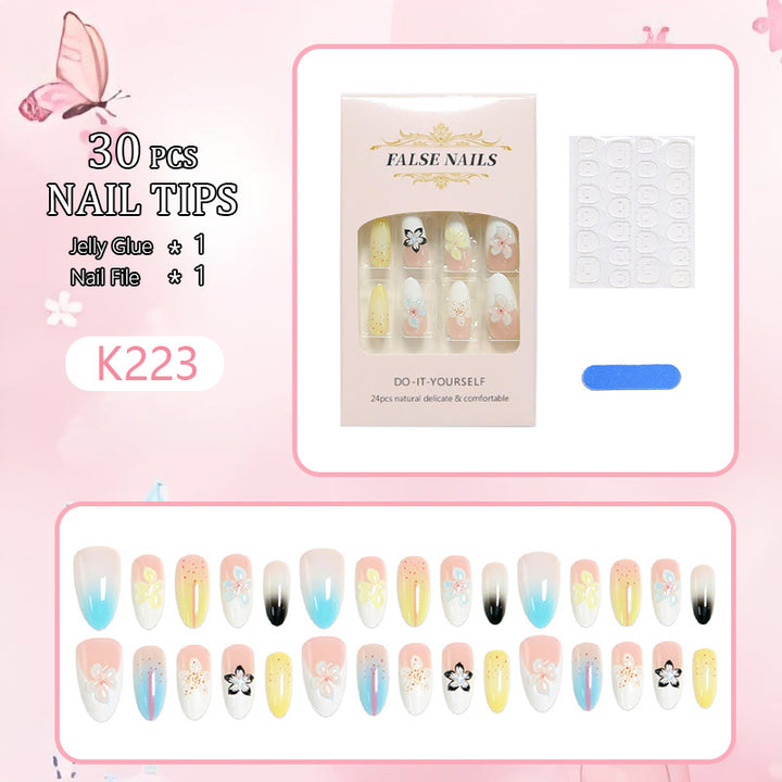 Artificial nail set with floral and glittering decorations Stornfield