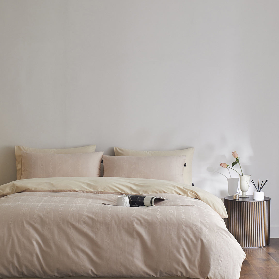 Reversible cotton percale bedding set with fine relief texture and additional pillowcases