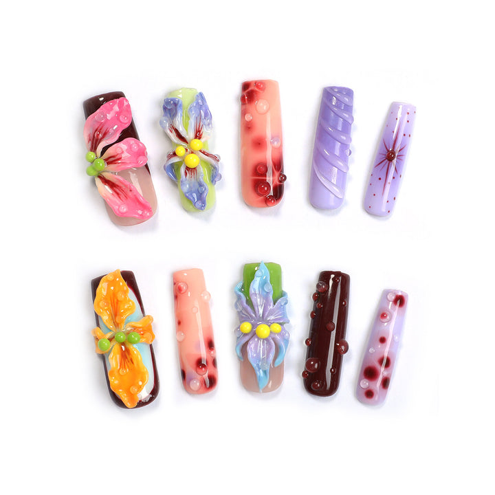Creative artificial nail set with elegant floral design and glitter accents Stornfield