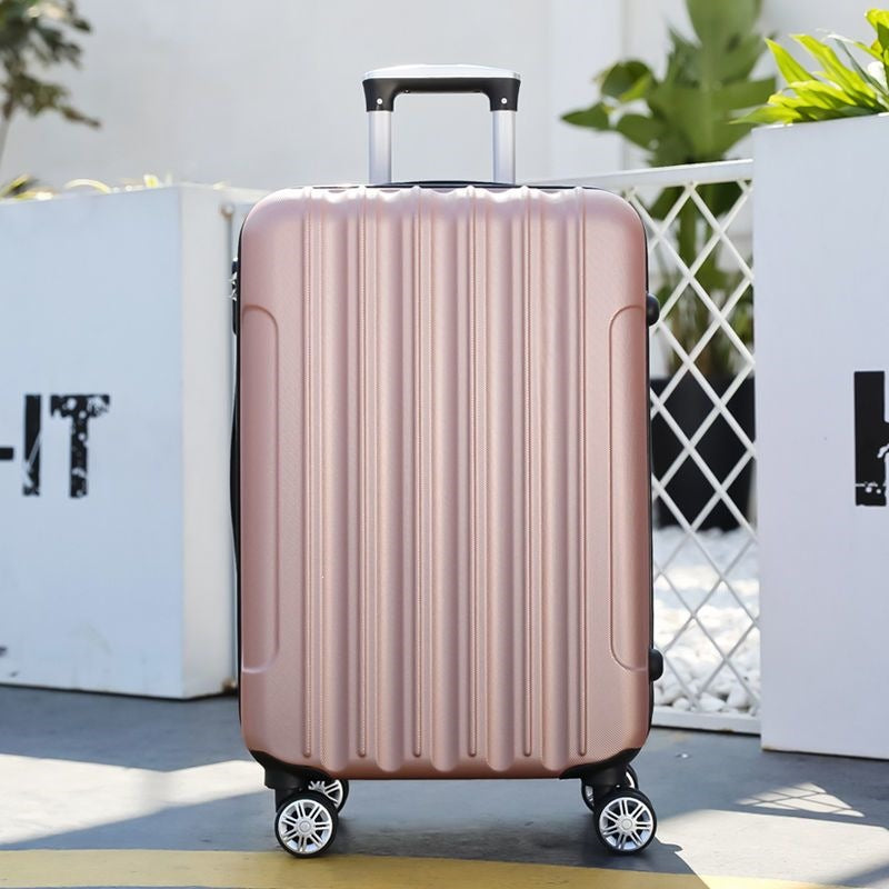 Hard shell suitcase with 360-degree wheel system and integrated safety feature Stornfield