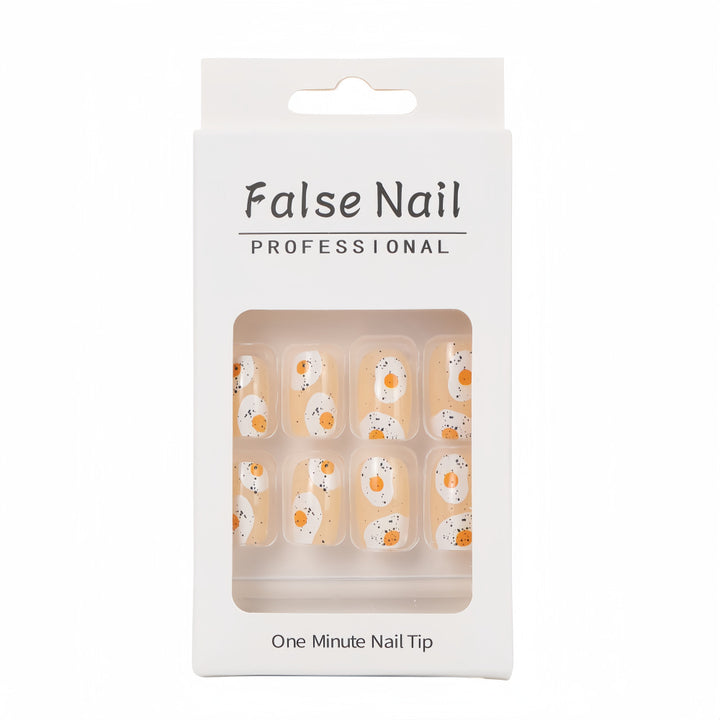 Artificial nails in creative fried egg design Stornfield