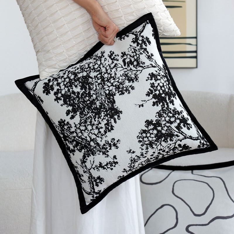 Decorative pillow with tree motif