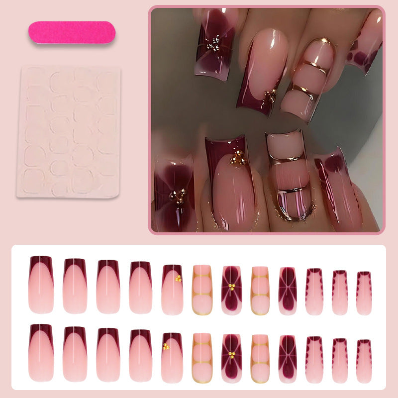Artificial nail set with elegant gradient and delicate decorations Stornfield