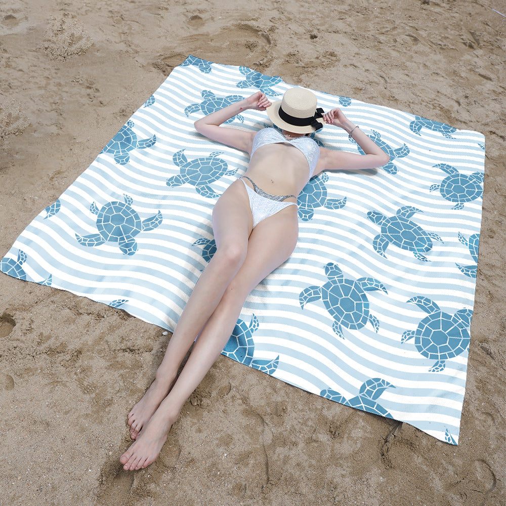 Beach blanket with colorful turtle pattern Stornfield