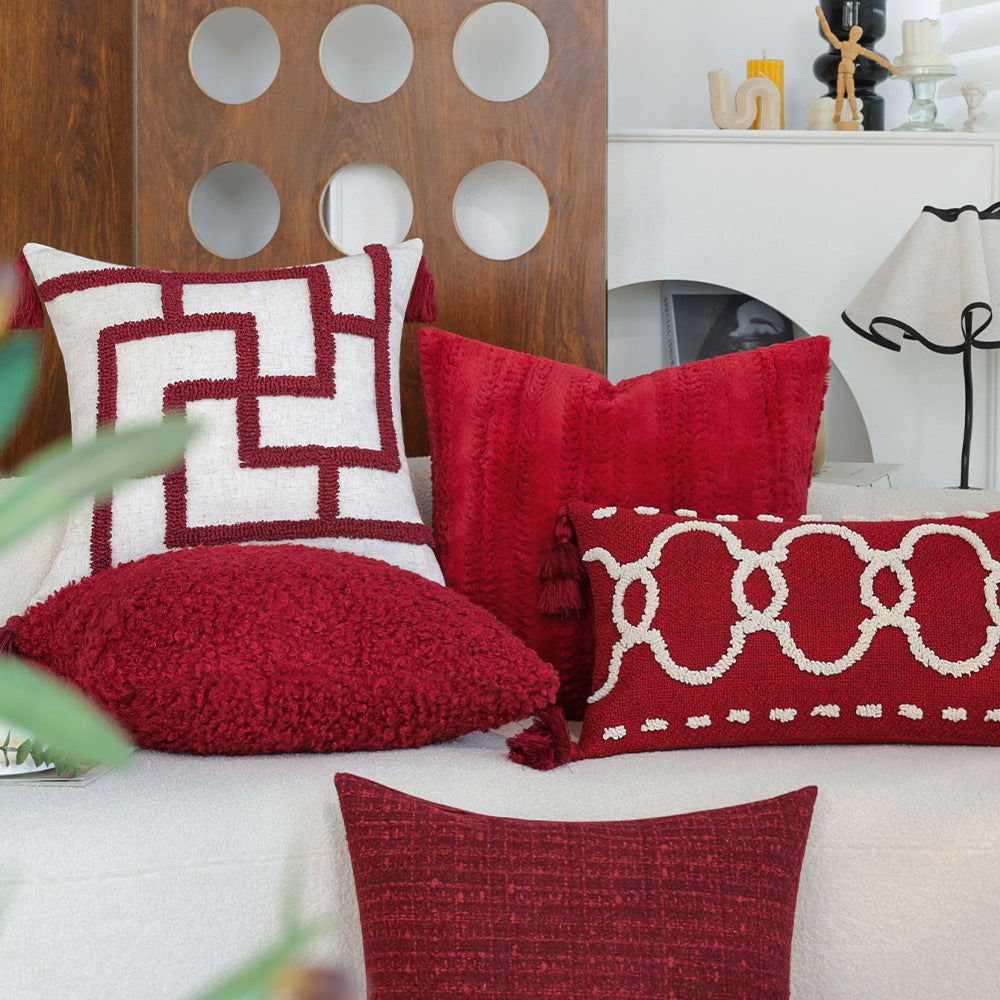 Rectangular decorative cushion with bouclé relief and tassels Stornfield