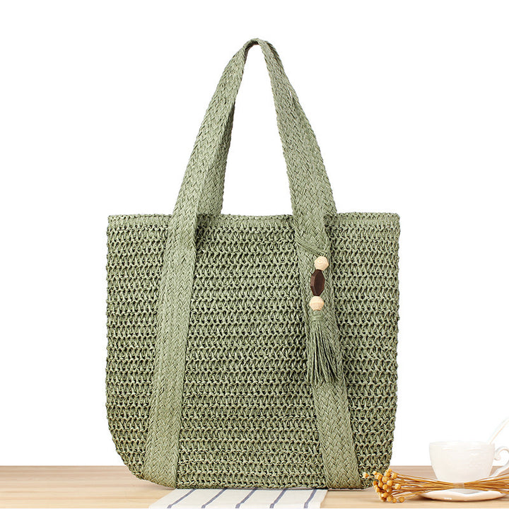 Eco-friendly straw tote bag with elegant tassel detail Stornfield