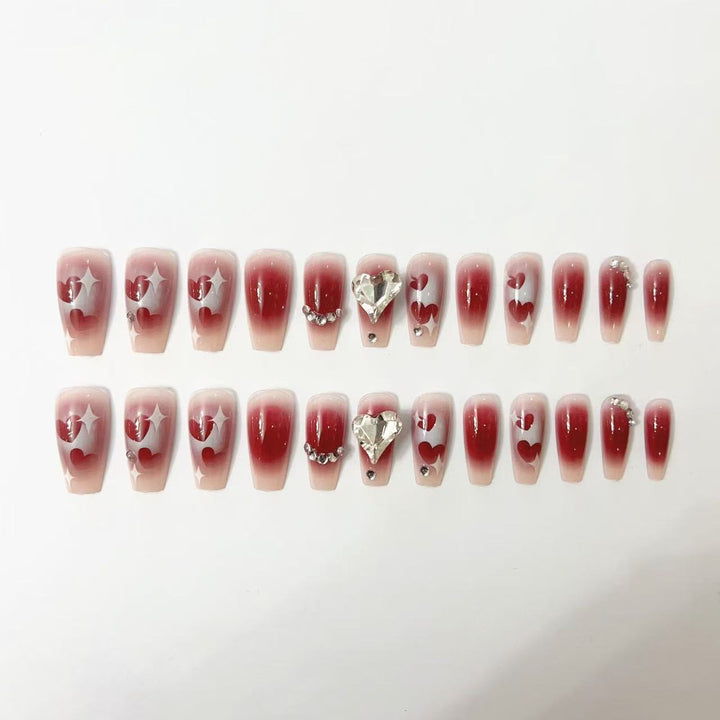 Artificial nails in romantic heart design Stornfield