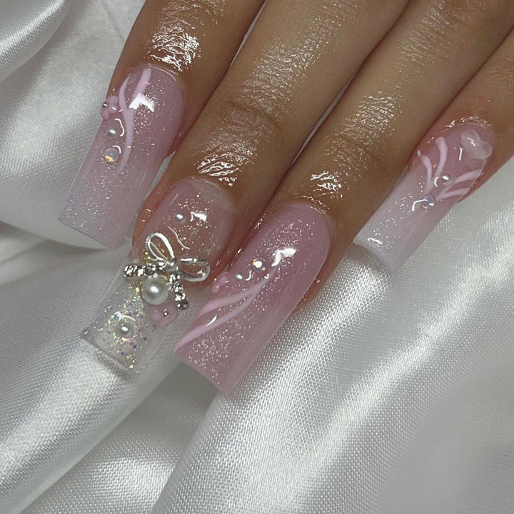 Artistic acrylic nails with elegant jewelry accents Stornfield