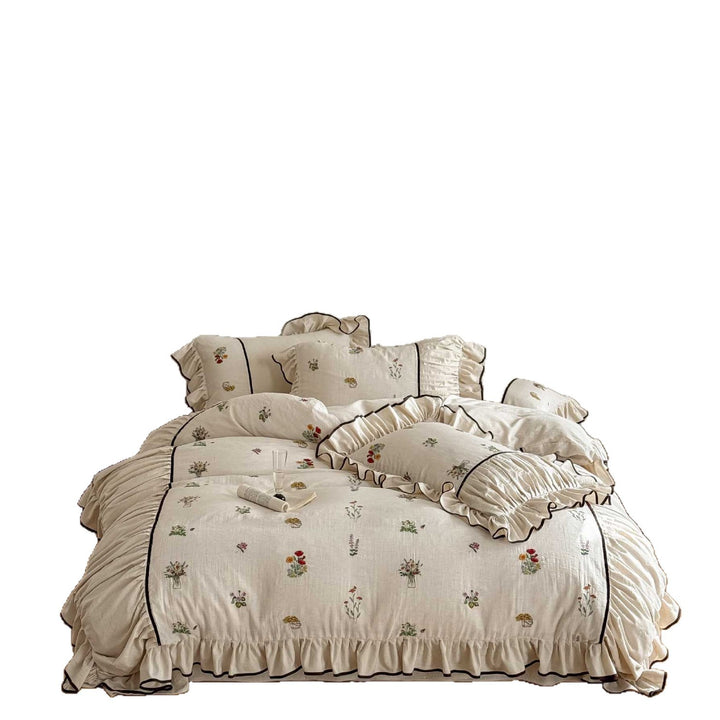 High-quality bed linen set made of linen-cotton blend with wildflower embroidery and ruffled hem