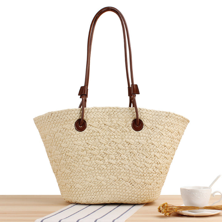 Beach bag made of high-quality braided straw with stylish leather handles Stornfield