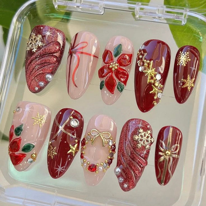 Artificial nail set with luxurious Christmas designs and glamorous accents Stornfield
