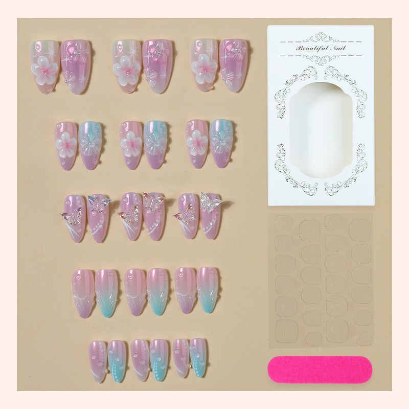 Artificial nail set with floral accents and glitter Stornfield