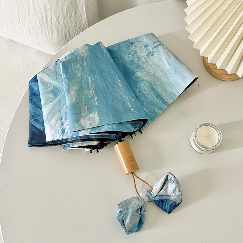 Ladies elegant folding umbrella with unique marble pattern Stornfield