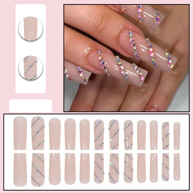 Acrylic nail set with sparkling rhinestone accents Stornfield