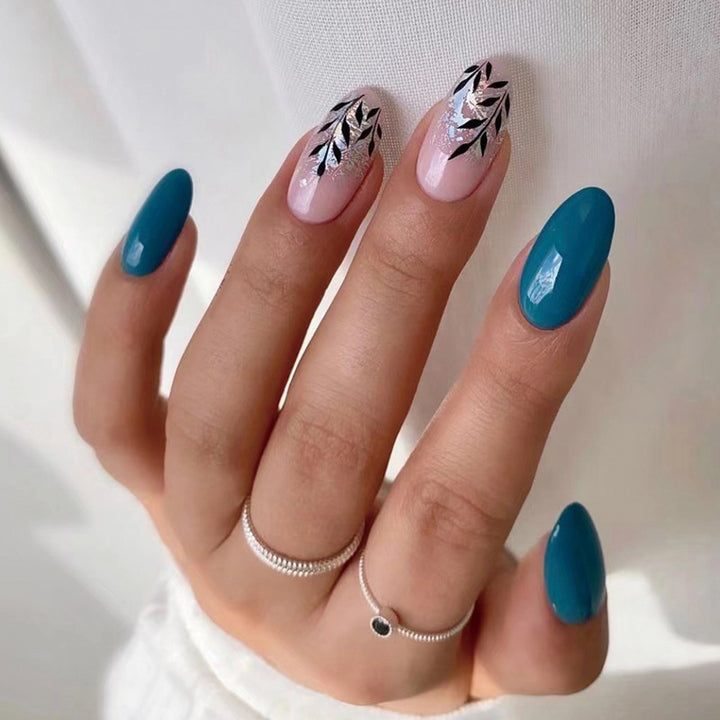 Elegant Nail Art with Floral Accent and Metallic Details Stornfield