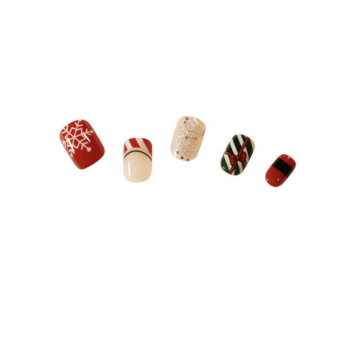 Elegant artificial nails with golden accents and floral design Stornfield