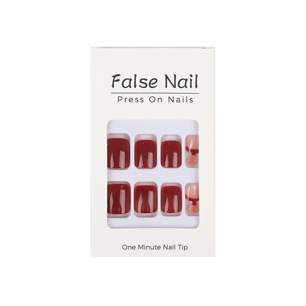 Acrylic nail set in elegant red and nude design Stornfield