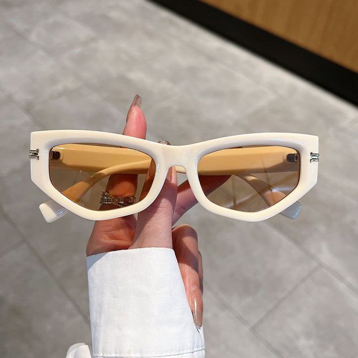 Ladies geometric sunglasses with curved frame and protective UV filter Stornfield
